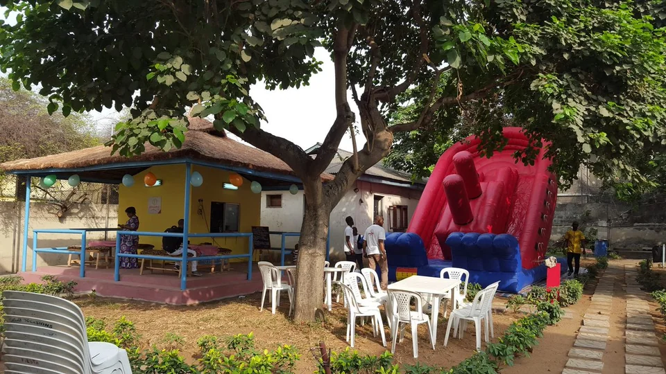 Outdoor tables and shaded seating in the Pancake Hub courtyard